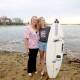 Surfer April Davey, 20, with her mother Danielle. Picture by Chris Lane